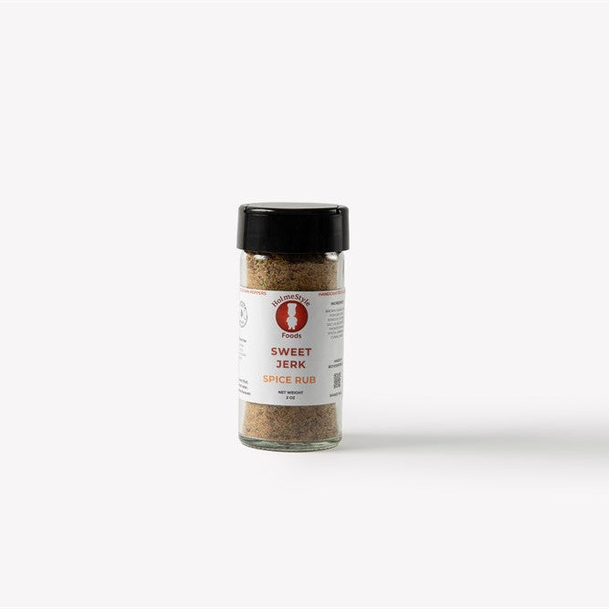 Spice jar labeled 'Sweet Jerk' on a white background