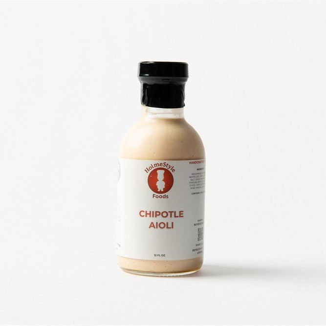 Bottle of chipotle aioli on a white background